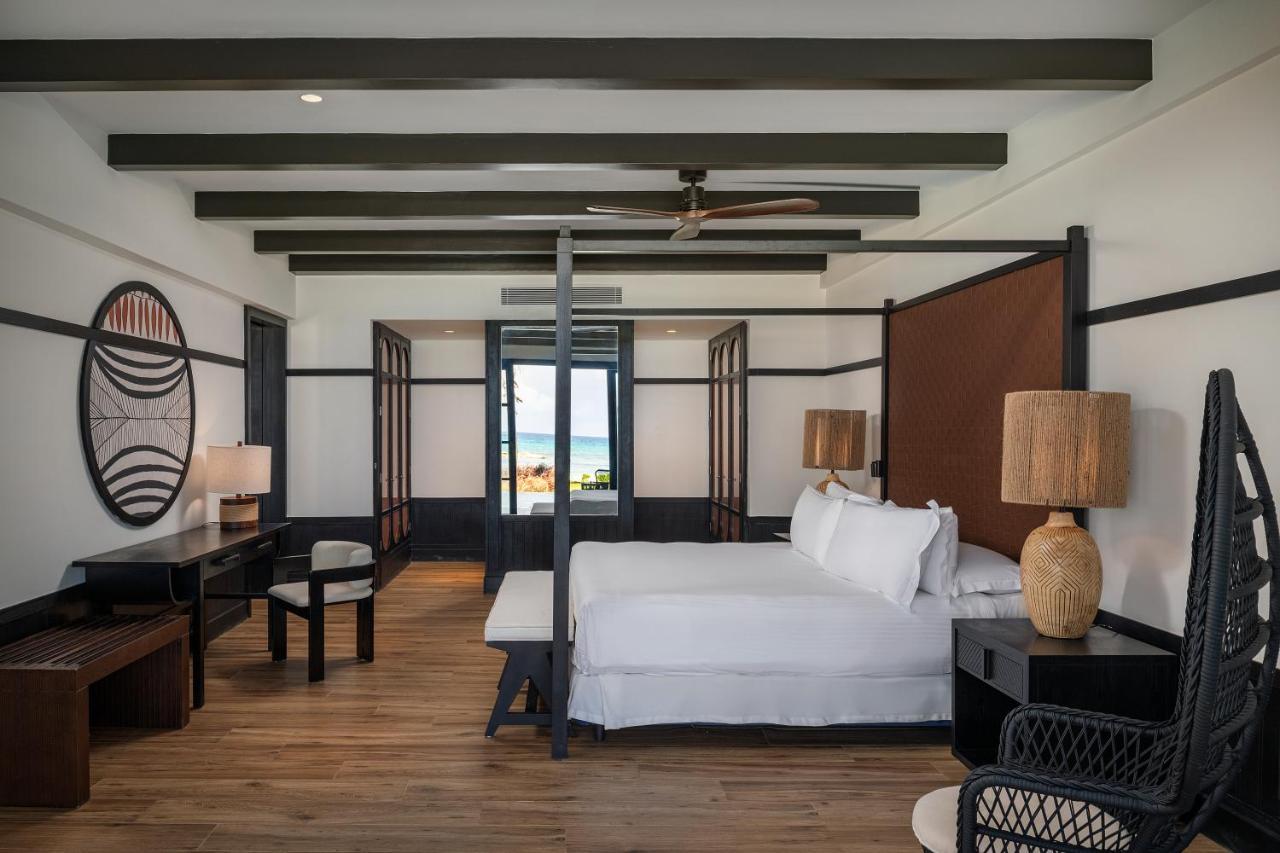 Ocean Eden Bay (Adults Only) Hotel Spring Rises Kültér fotó A bedroom at the hotel